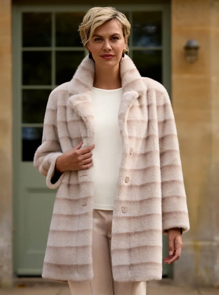 Manteau réversible en fausse fourrure